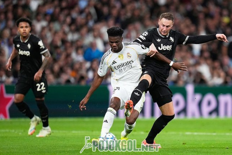 Terjadi duel sengit saat Teun Koopmeiners berebut bola dengan Aurelien Tchouameni dalam pertandingan Liga Champions antara Juventus dan Real Madrid.