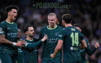 Erling Haaland, penyerang Manchester City, terlihat merayakan gol kedua timnya bareng rekan-rekan mereka saat bertanding di Liga Champions melawan Real Madrid pada hari Kamis, (11/12/2025).