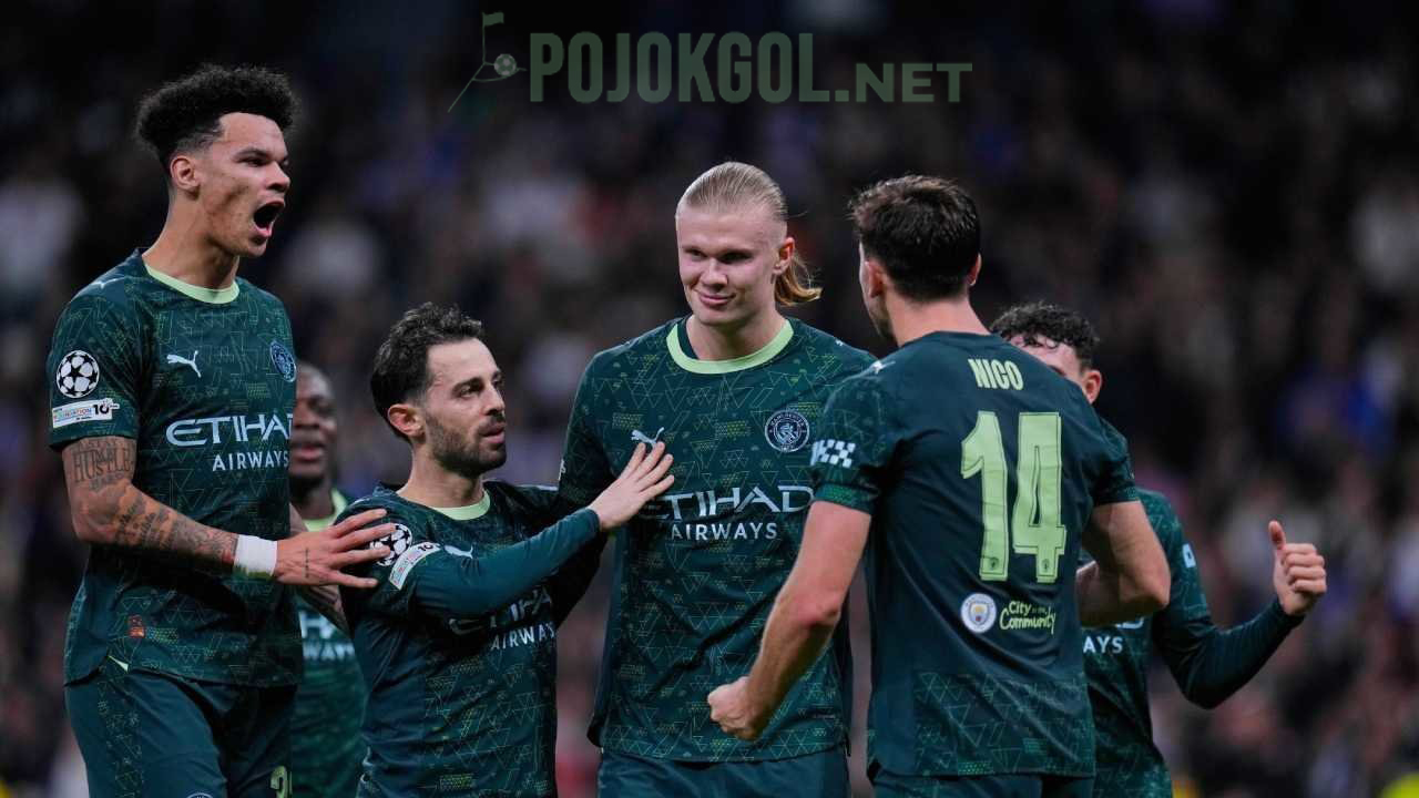 Erling Haaland, penyerang Manchester City, terlihat merayakan gol kedua timnya bareng rekan-rekan mereka saat bertanding di Liga Champions melawan Real Madrid pada hari Kamis, (11/12/2025).