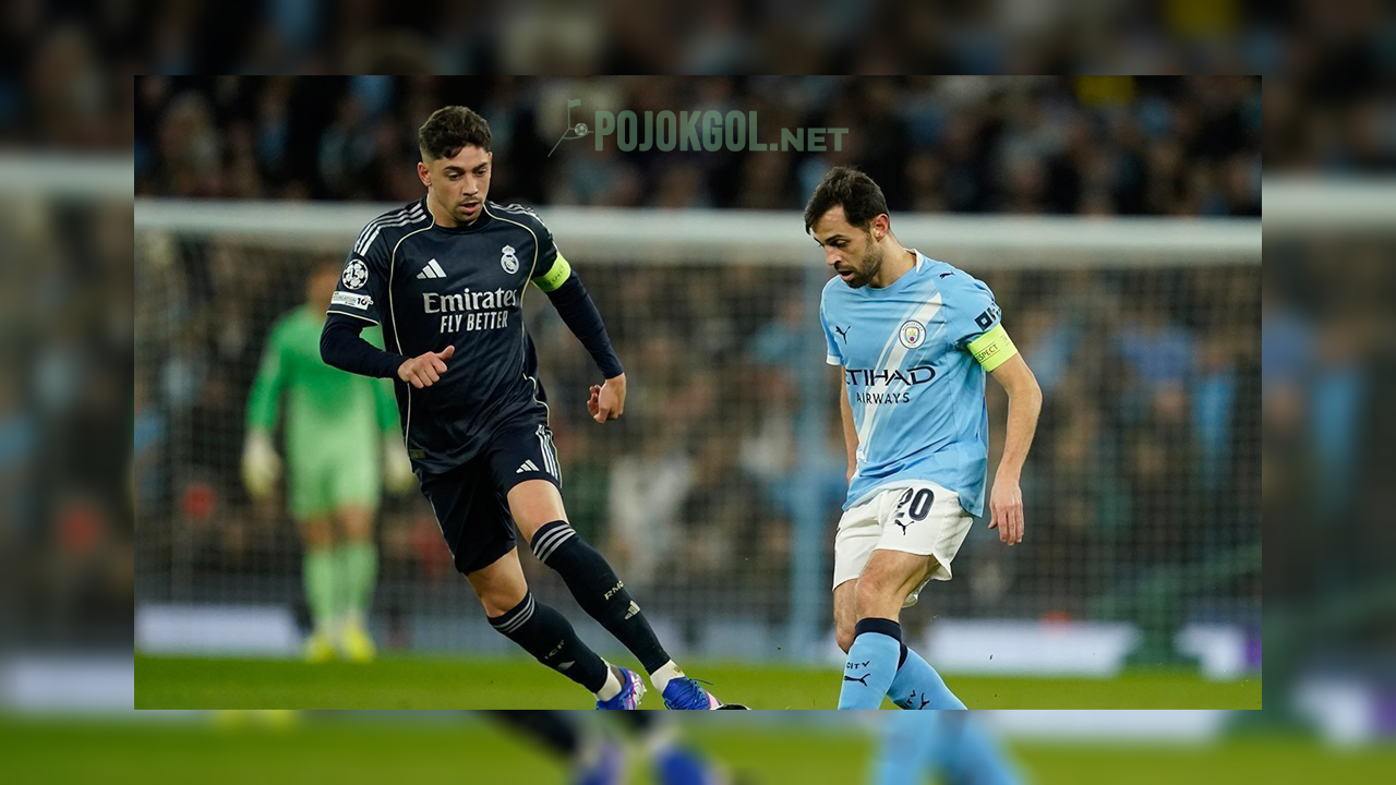 Bernardo Silva dan Federico Valverde duel memperebutkan bola waktu Manchester City menjamu Real Madrid di leg kedua 16 besar Liga Champions, yang digelar di Etihad Stadium pada 18 Maret 2026.