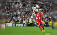 Bintang Real Madrid, Aurelien Tchouameni, melakukan selebrasi setelah mencetak gol pertama ke gawang Benfica di leg kedua play-off Liga Champions, Kamis (26 Februari 2026) dini hari WIB.