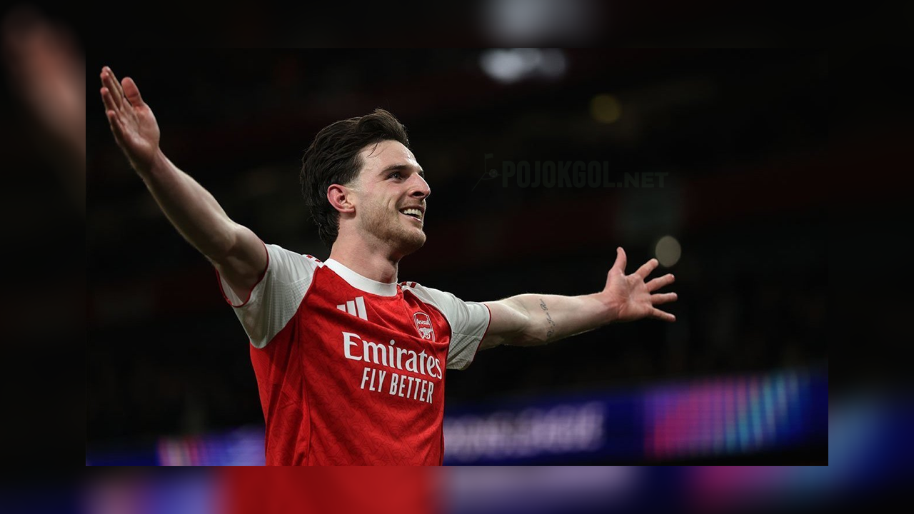 Momen Declan Rice merayakan golnya buat Arsenal waktu lawan Bayer Leverkusen di leg kedua babak 16 besar Liga Champions 2026.